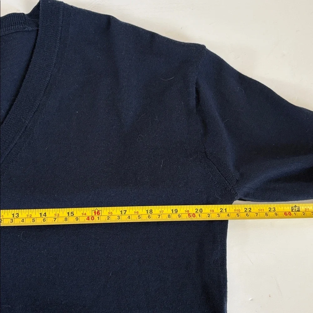 J. Crew 100% merino wool navy blue v-neckline flare sleeve hi lo sweater